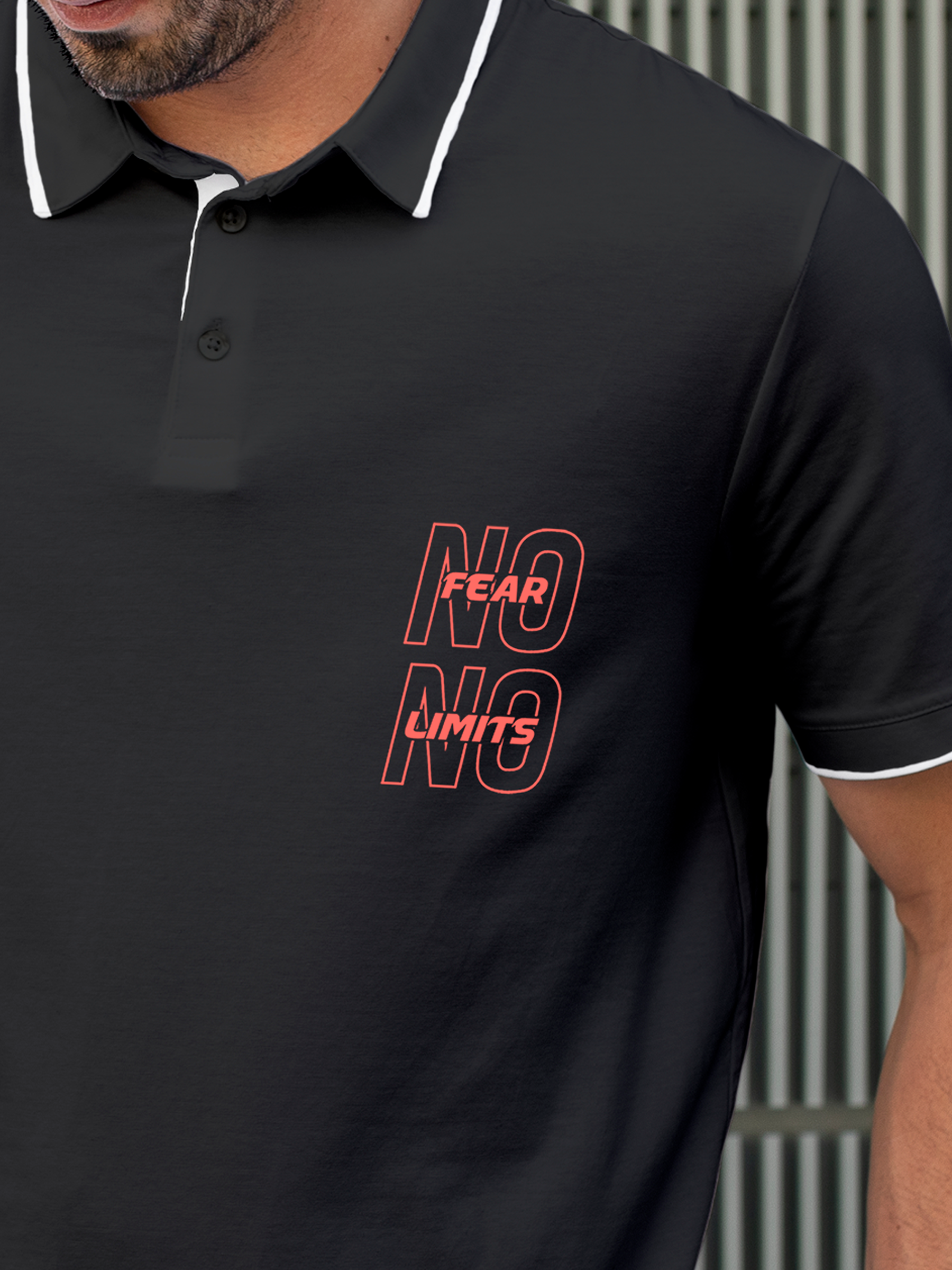 Close up of 'No Fear No Limits' design on Men's Charcoal Grey Polo T-shirt, highlighting intricate details and vibrant print.