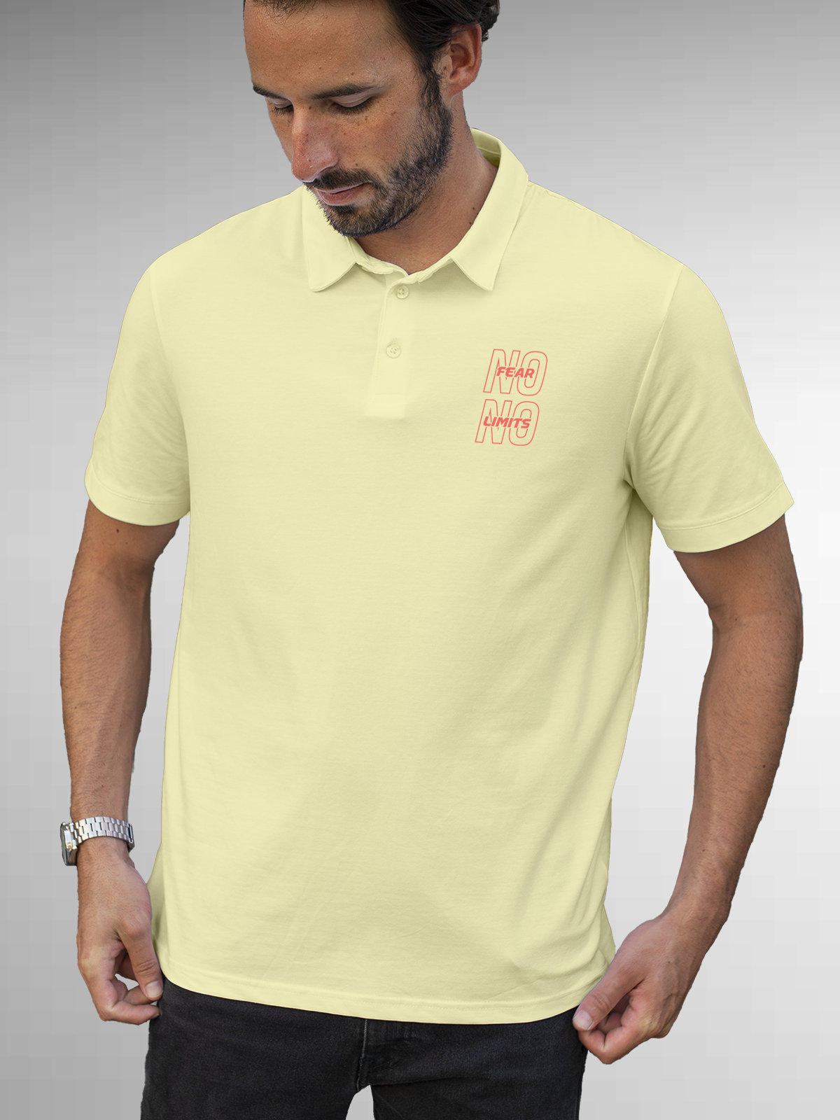 Model wearing Men's Yellow Polo T-shirt with 'No Fear No Limits' design, offering effortless style and premium comfort