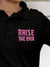 Close up of 'Raise The Bar' design on Women's Black Polo T-shirt, highlighting intricate details and vibrant print.