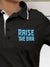 Close up of 'Raise The Bar' design on Women's Dark Grey Polo T-shirt, highlighting intricate details and vibrant print.