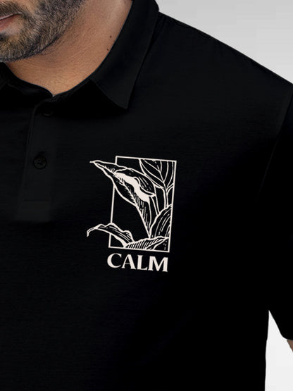 Close up of 'Calm' design on Men's Black Polo T-shirt, highlighting intricate details and vibrant print.
