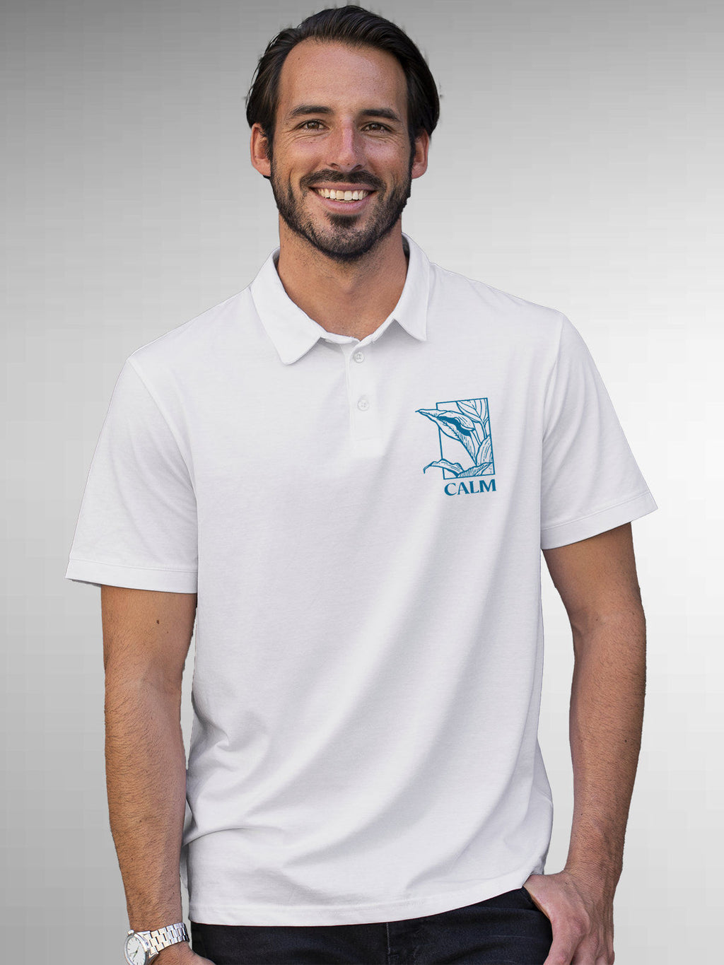 Model wearing Men's White Polo T-shirt with 'Calm' design, offering effortless style and premium comfort