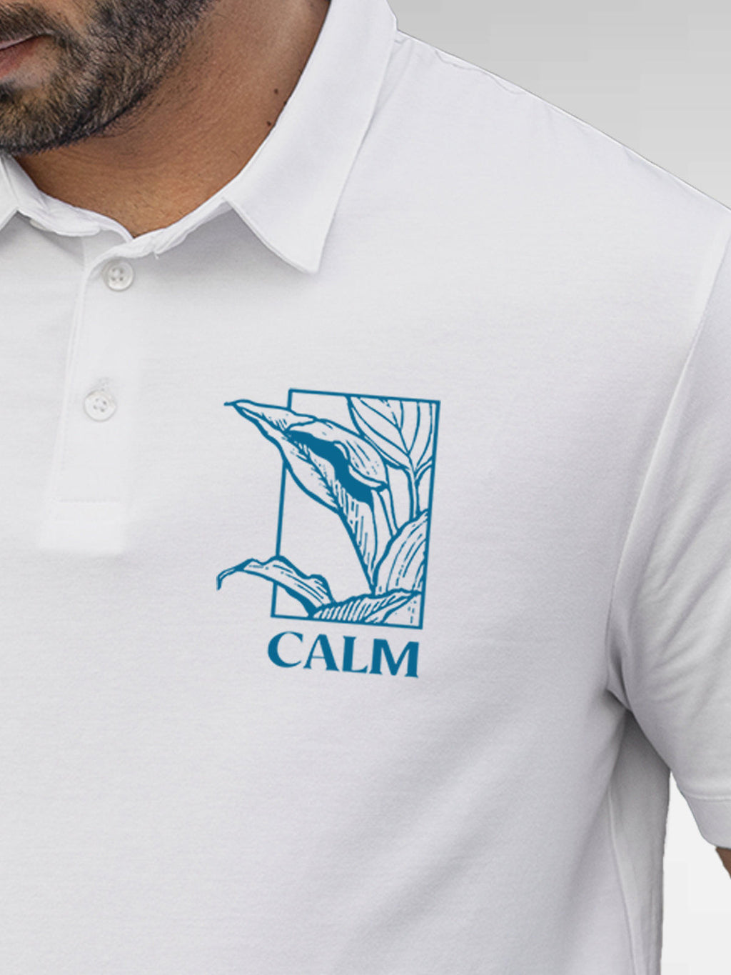 Close up of 'Calm' design on Men's White Polo T-shirt, highlighting intricate details and vibrant print.