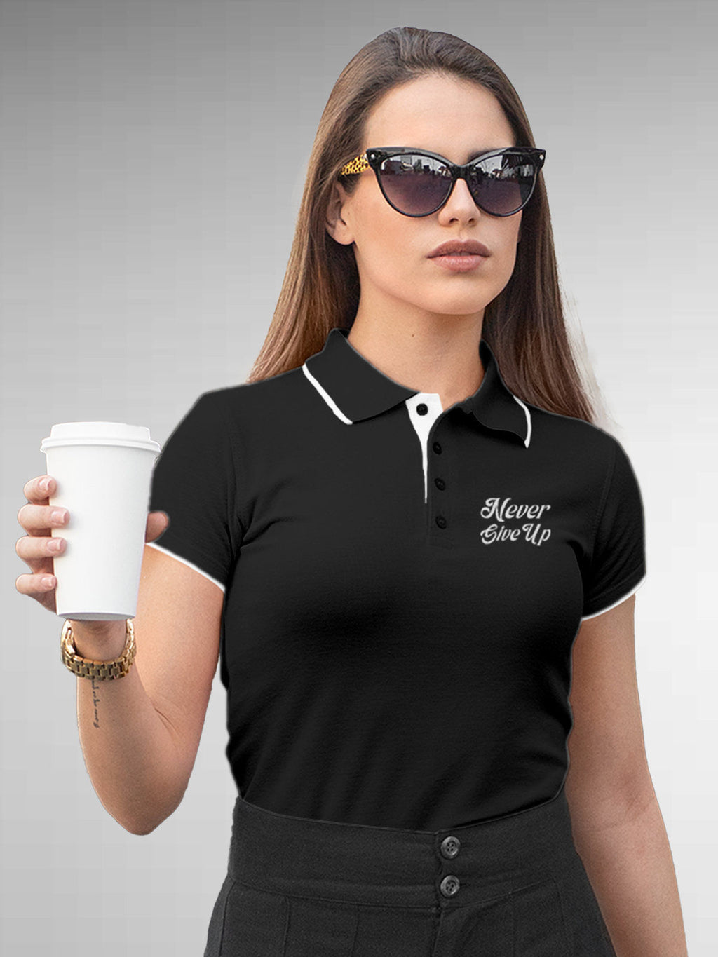Model wearing Women's Dark Grey Polo T-shirt with 'Never Give Up' design, offering effortless style and premium comfort