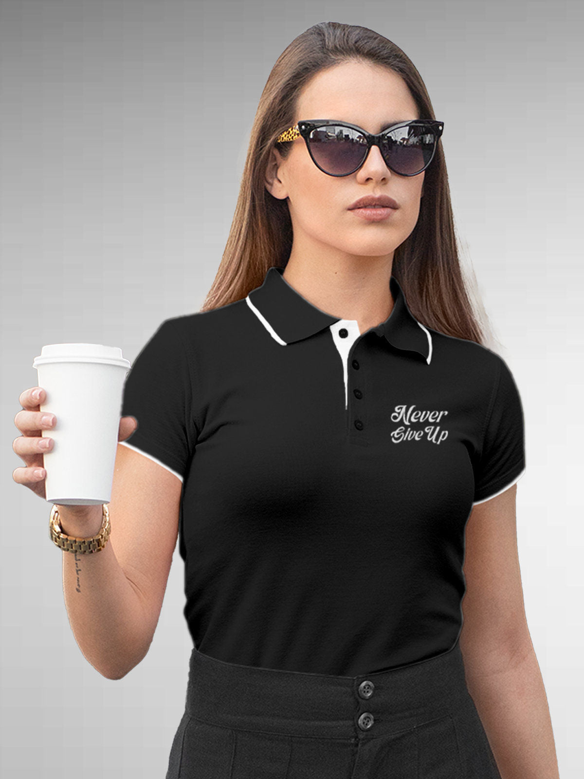 Model wearing Women's Dark Grey Polo T-shirt with 'Never Give Up' design, offering effortless style and premium comfort