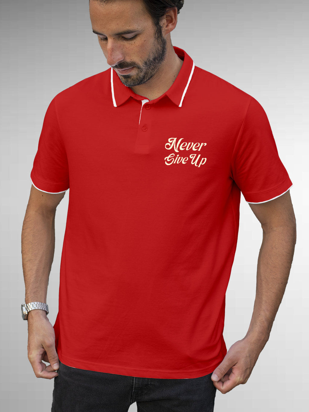 Model wearing Men's Red Polo T-shirt with 'Never Give Up' design, offering effortless style and premium comfort