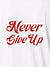 Close up of 'Never Give Up' design on Women's White Polo T-shirt, highlighting intricate details and vibrant print.
