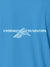 Close up of 'Unshaken Foundation' design on Men's Blue Polo T-shirt, highlighting intricate details and vibrant print.