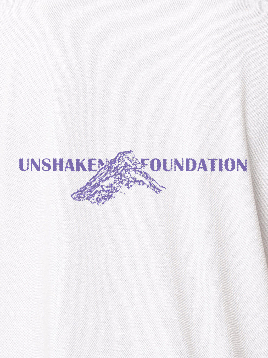 Close up of 'Unshaken Foundation' design on Men's White Polo T-shirt, highlighting intricate details and vibrant print.