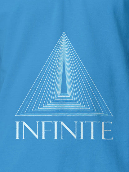 Close up of 'Go Infinite' design on Men's Blue Polo T-shirt, highlighting intricate details and vibrant print.