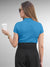 Back view of Fighterhero Women's Blue Polo T-shirt, highlighting the modern look and clean finish