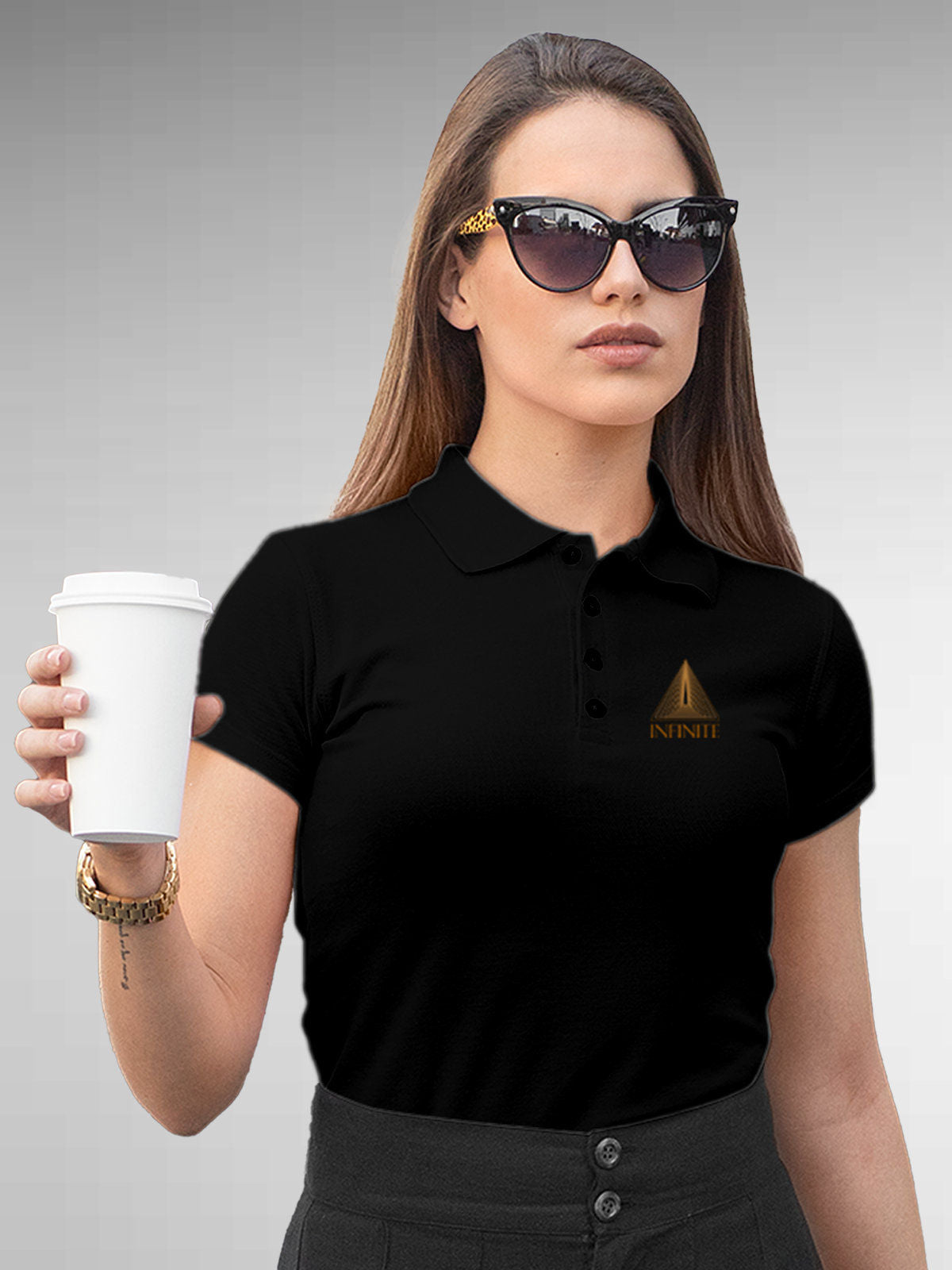 Model wearing Women's Black Polo T-shirt with 'Go Infinite' design, offering effortless style and premium comfort