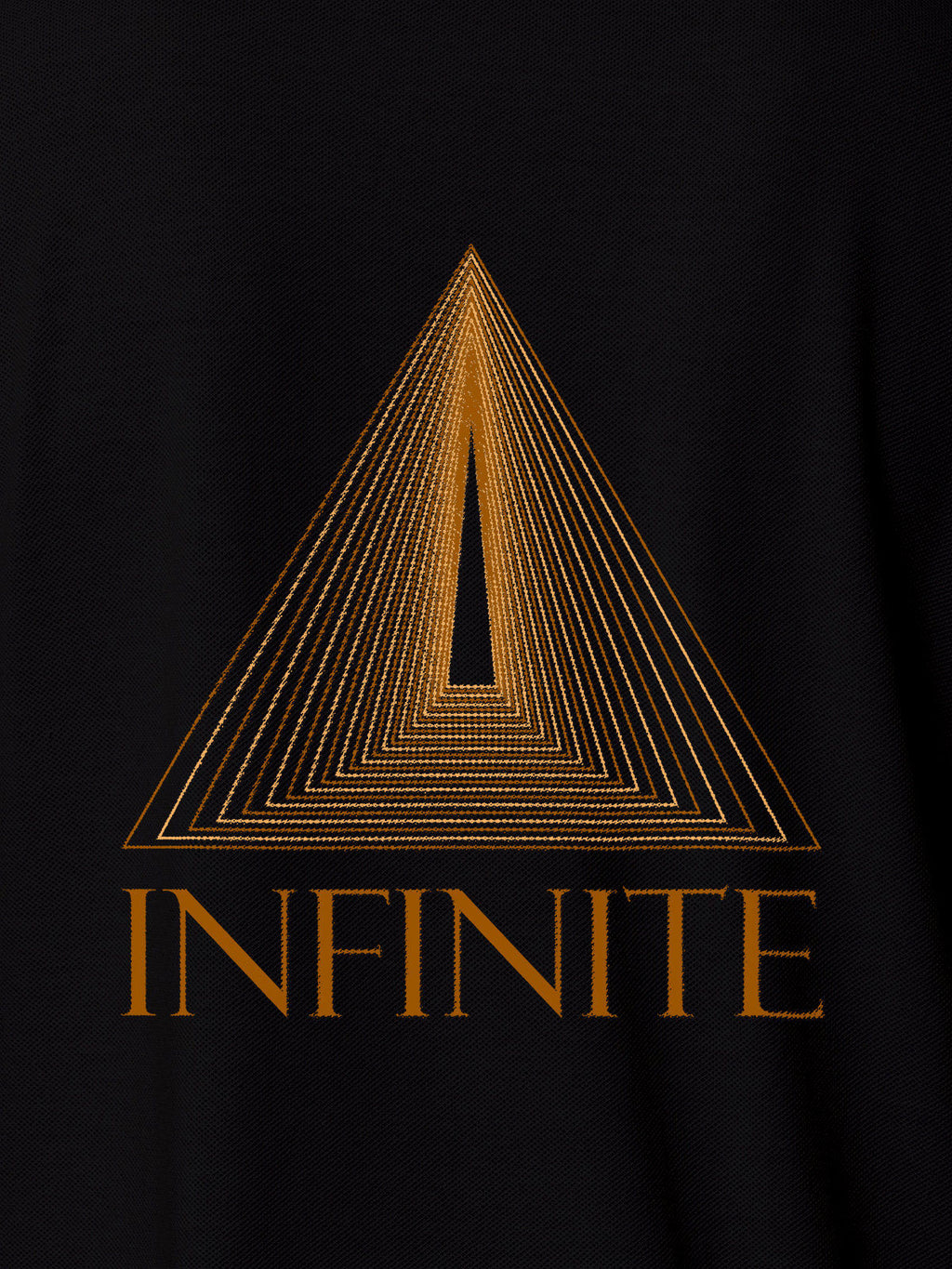 Close up of 'Go Infinite' design on Women's Black Polo T-shirt, highlighting intricate details and vibrant print.