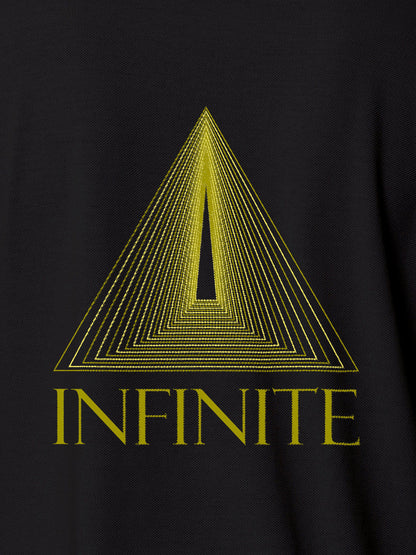 Close up of 'Go Infinite' design on Women's Dark Grey Polo T-shirt, highlighting intricate details and vibrant print.