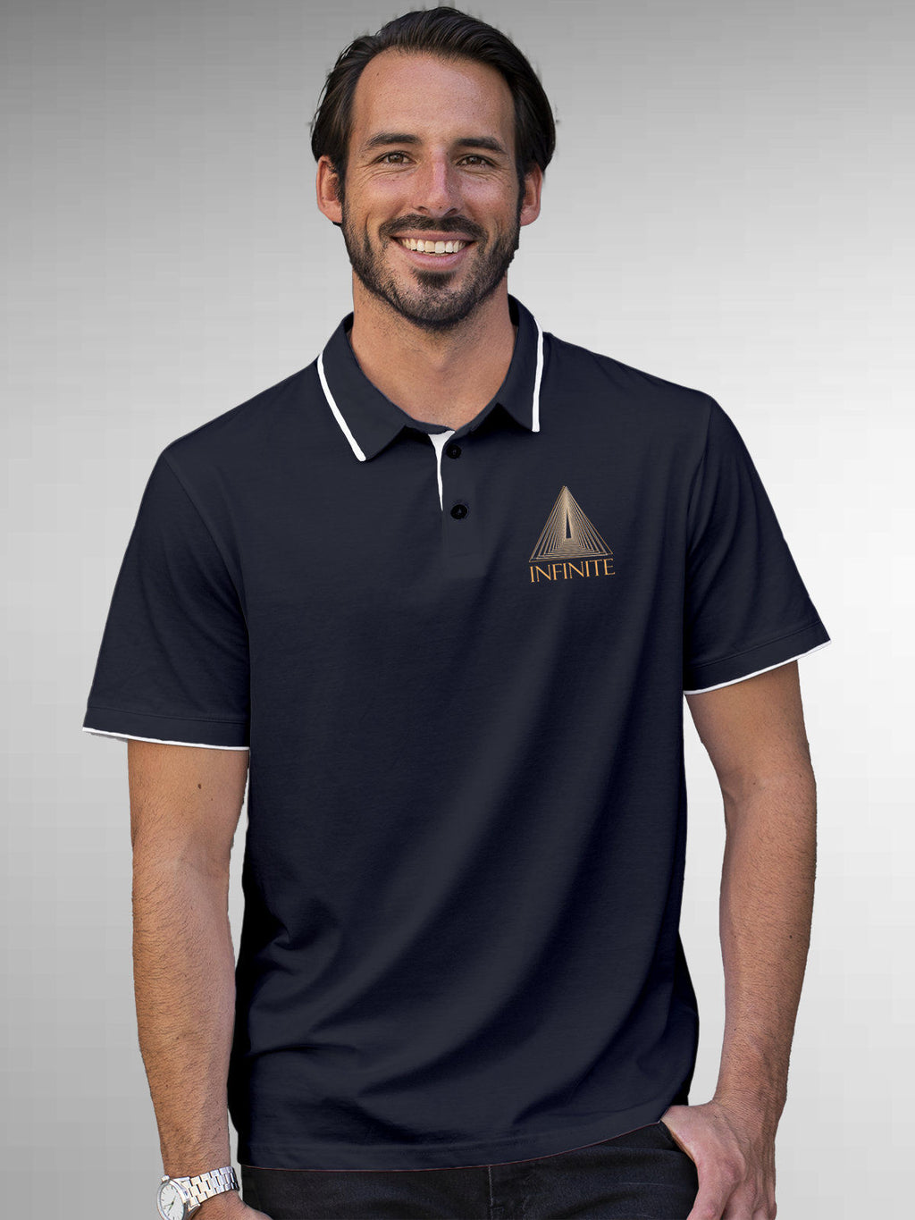 Model wearing Men's Navy Blue Polo T-shirt with 'Go Infinite' design, offering effortless style and premium comfort