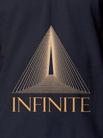 Close up of 'Go Infinite' design on Men's Navy Blue Polo T-shirt, highlighting intricate details and vibrant print.