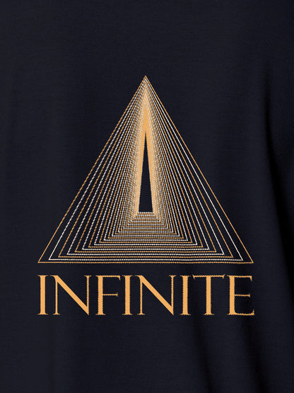 Close up of 'Go Infinite' design on Women's Navy Blue Polo T-shirt, highlighting intricate details and vibrant print.
