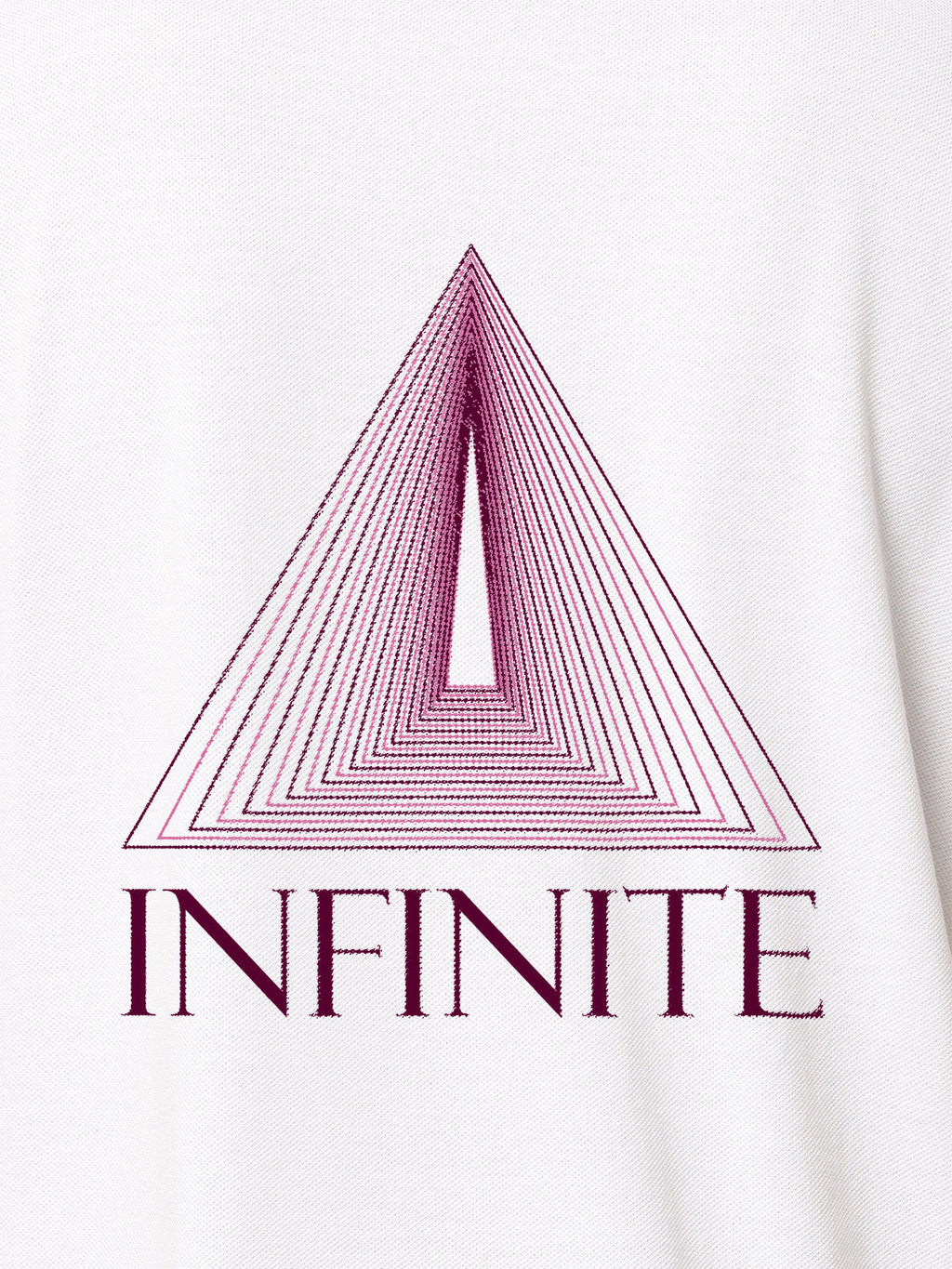 Close up of 'Go Infinite' design on Women's White Polo T-shirt, highlighting intricate details and vibrant print.