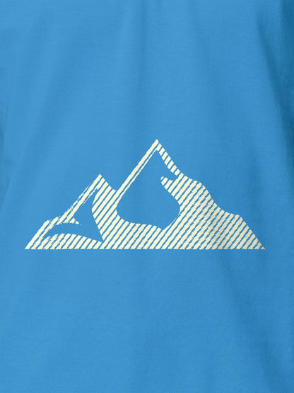 Close up of 'Grit' design on Men's Blue Polo T-shirt, highlighting intricate details and vibrant print.