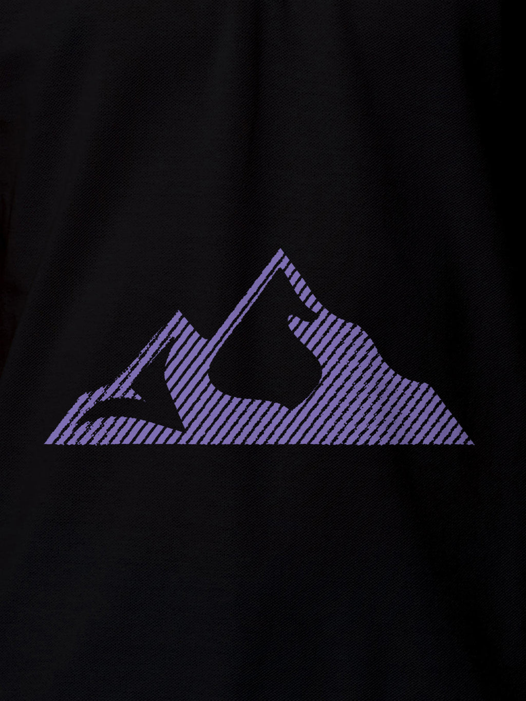 Close up of 'Grit' design on Men's Black Polo T-shirt, highlighting intricate details and vibrant print.