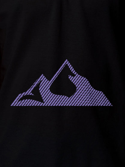 Close up of 'Grit' design on Men's Black Polo T-shirt, highlighting intricate details and vibrant print.
