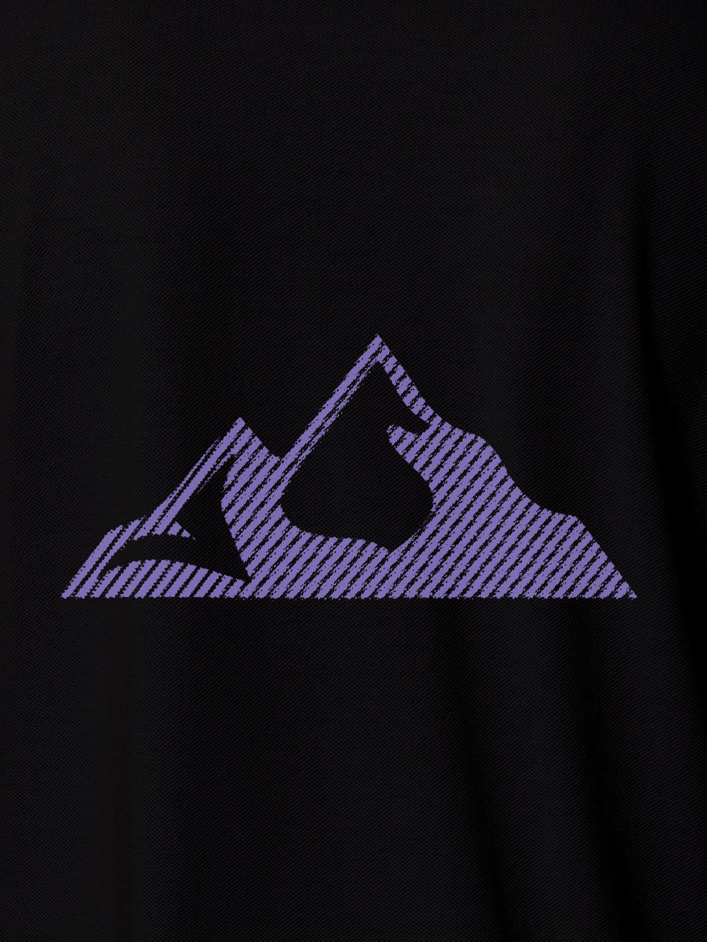 Close up of 'Grit' design on Women's Black Polo T-shirt, highlighting intricate details and vibrant print.