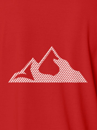 Close up of 'Grit' design on Women's Red Polo T-shirt, highlighting intricate details and vibrant print.