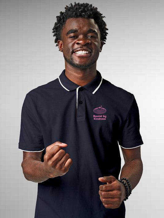 Model wearing Men's Navy Blue Polo T-shirt with 'Bound By Kindness' design, offering effortless style and premium comfort