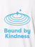 Close up of 'Bound By Kindness' design on Women's White Polo T-shirt, highlighting intricate details and vibrant print.