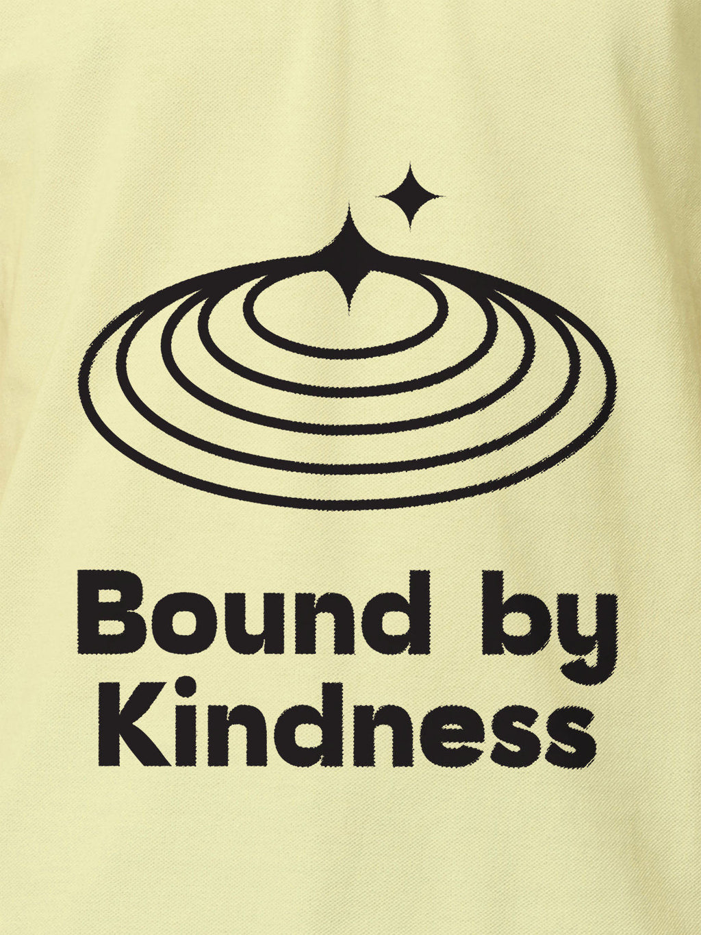 Close up of 'Bound By Kindness' design on Men's Yellow Polo T-shirt, highlighting intricate details and vibrant print.