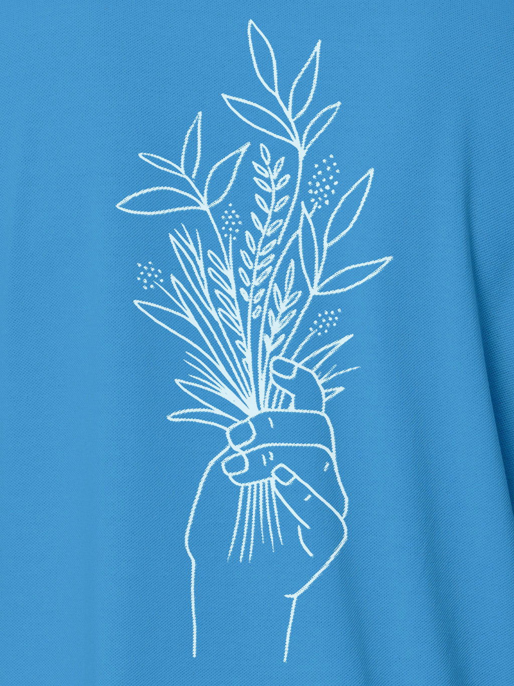 Close up of 'Love and Joy' design on Men's Blue Polo T-shirt, highlighting intricate details and vibrant print.