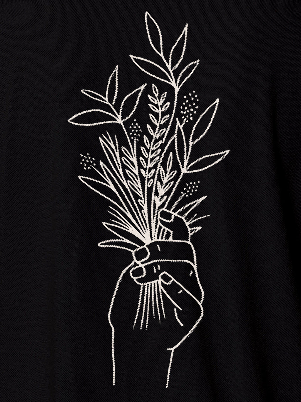 Close up of 'Love and Joy' design on Men's Black Polo T-shirt, highlighting intricate details and vibrant print.