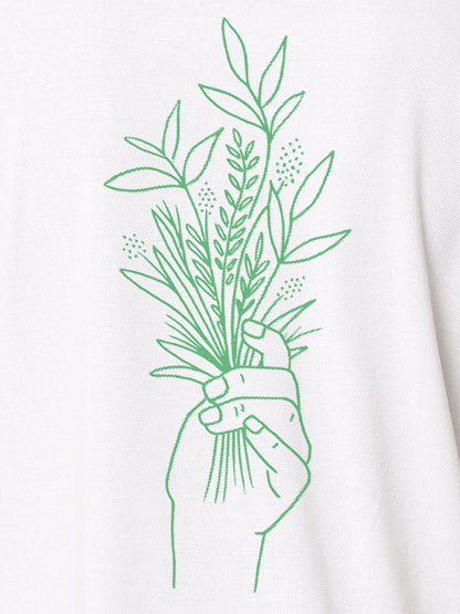Close up of 'Love and Joy' design on Men's White Polo T-shirt, highlighting intricate details and vibrant print.