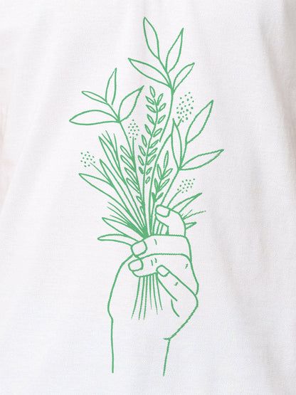 Close up of 'Love and Joy' design on Women's White Polo T-shirt, highlighting intricate details and vibrant print.
