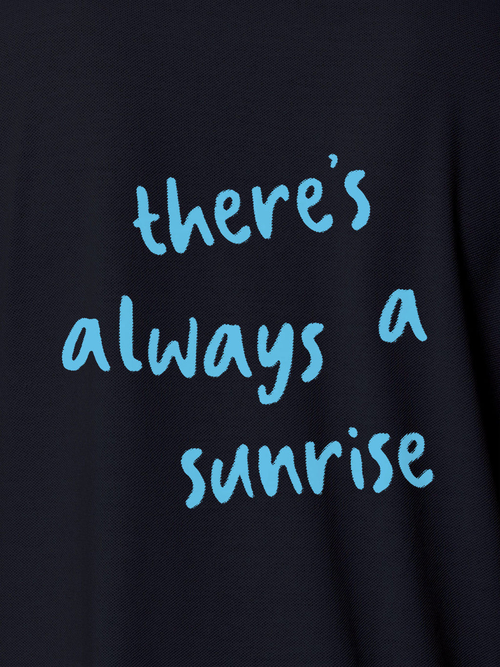 Close up of 'There's Always a Sunrise' design on Women's Navy Blue Polo T-shirt, highlighting intricate details and vibrant print.