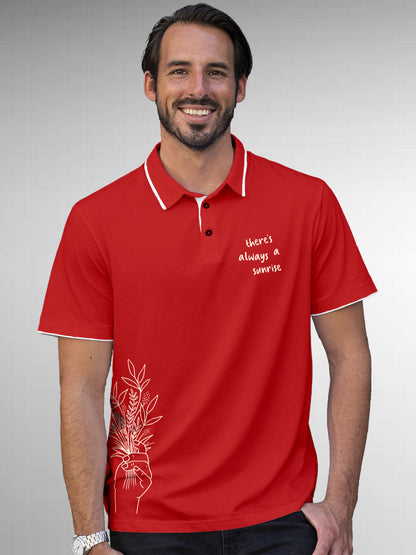 Model wearing Men's Red Polo T-shirt with 'There's Always a Sunrise' design, offering effortless style and premium comfort