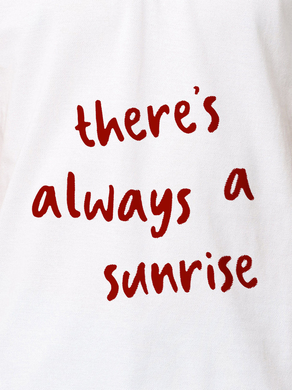 Close up of 'There's Always a Sunrise' design on Men's White Polo T-shirt, highlighting intricate details and vibrant print.