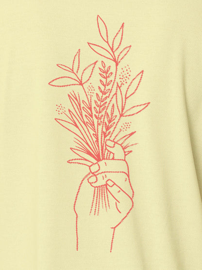 Close up of another 'There's Always a Sunrise' design on Women's Yellow Collar T-shirt, highlighting the vibrant print.