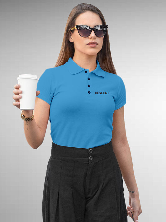 Model wearing Women's Blue Polo T-shirt with 'Resilient' design, offering effortless style and premium comfort