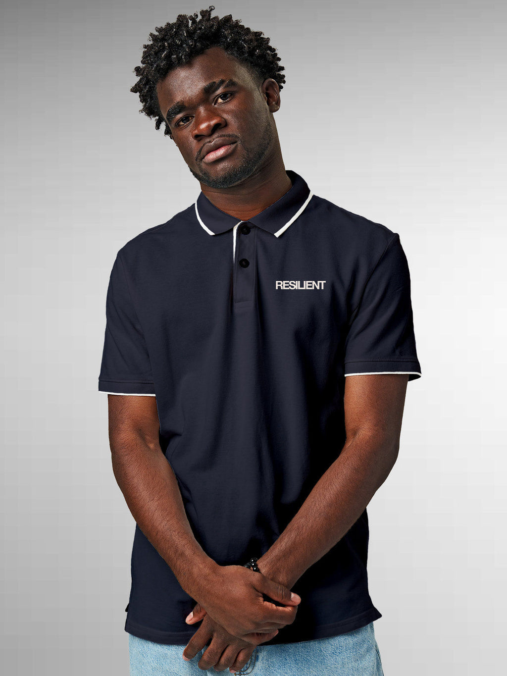 Model wearing Men's Navy Blue Polo T-shirt with 'Resilient' design, offering effortless style and premium comfort