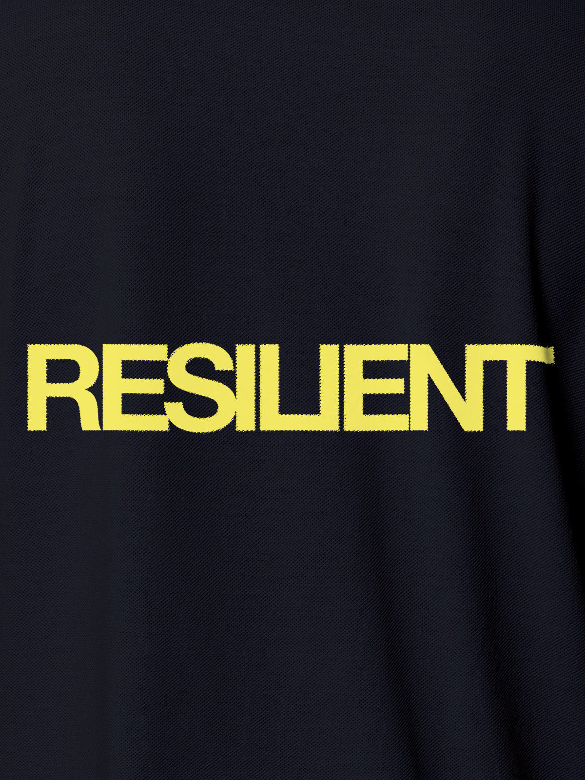 Close up of 'Resilient' design on Men's Navy Blue Polo T-shirt, highlighting intricate details and vibrant print.