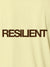Close up of 'Resilient' design on Men's Yellow Polo T-shirt, highlighting intricate details and vibrant print.