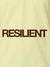 Close up of 'Resilient' design on Women's Yellow Polo T-shirt, highlighting intricate details and vibrant print.