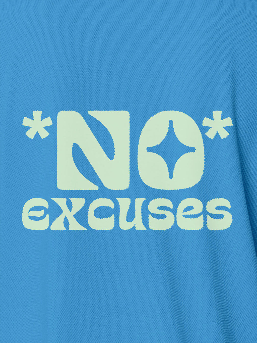 Close up of 'No Excuses' design on Women's Blue Polo T-shirt, highlighting intricate details and vibrant print.