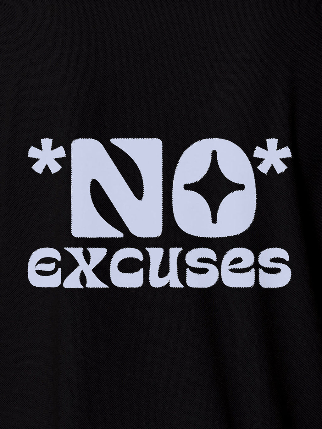 Close up of 'No Excuses' design on Women's Black Polo T-shirt, highlighting intricate details and vibrant print.