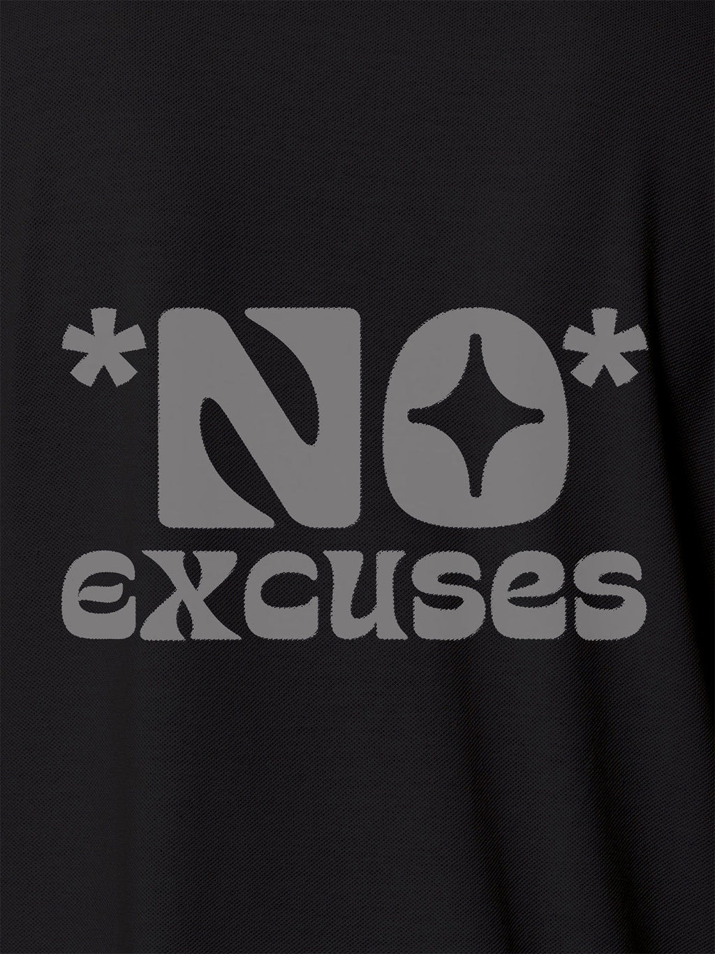 Close up of 'No Excuses' design on Women's Dark Grey Polo T-shirt, highlighting intricate details and vibrant print.