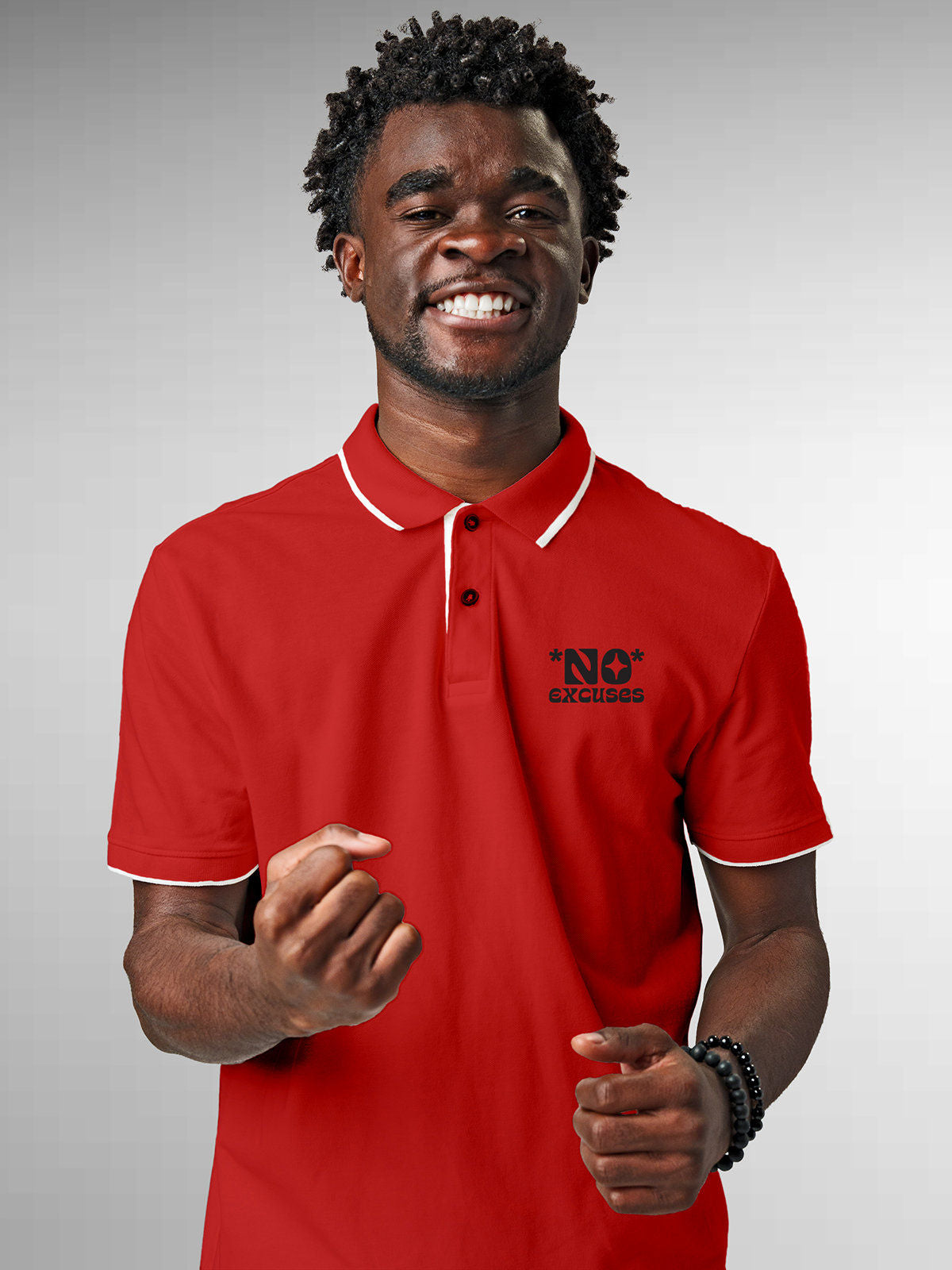 Model wearing Men's Red Polo T-shirt with 'No Excuses' design, offering effortless style and premium comfort