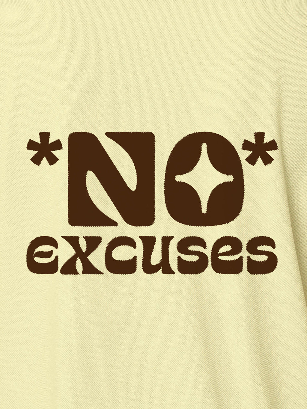 Close up of 'No Excuses' design on Women's Yellow Polo T-shirt, highlighting intricate details and vibrant print.