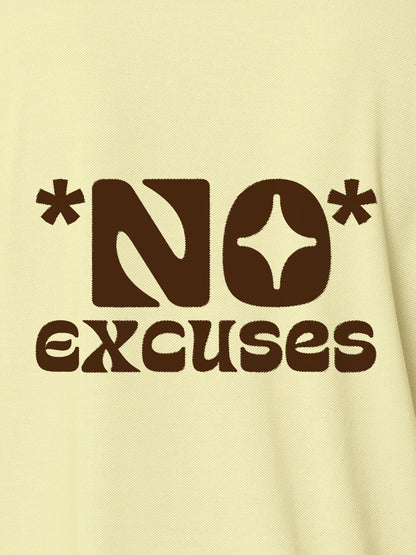 Close up of 'No Excuses' design on Women's Yellow Polo T-shirt, highlighting intricate details and vibrant print.