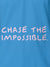 Close up of 'Chase The Impossible' design on Women's Blue Polo T-shirt, highlighting intricate details and vibrant print.
